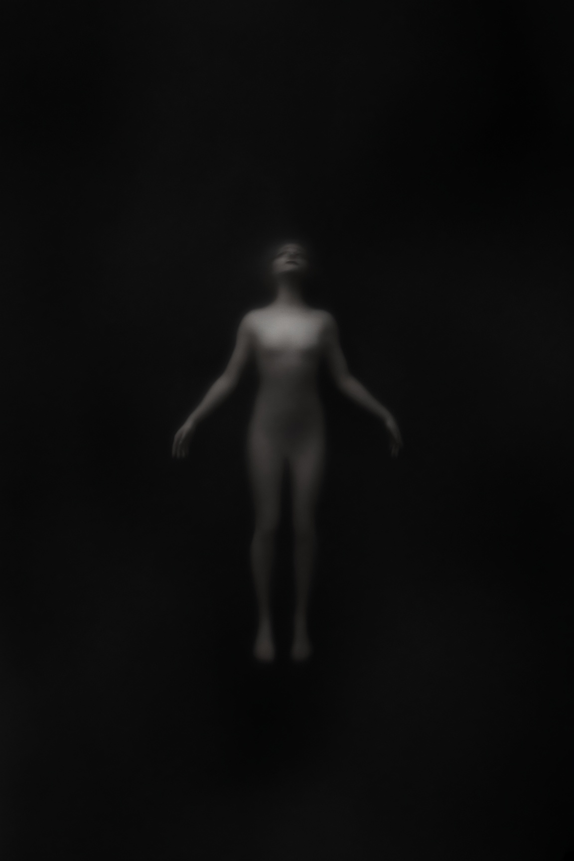 A barely visible human presence suspended in an empty dark field. No floor, no horizon.